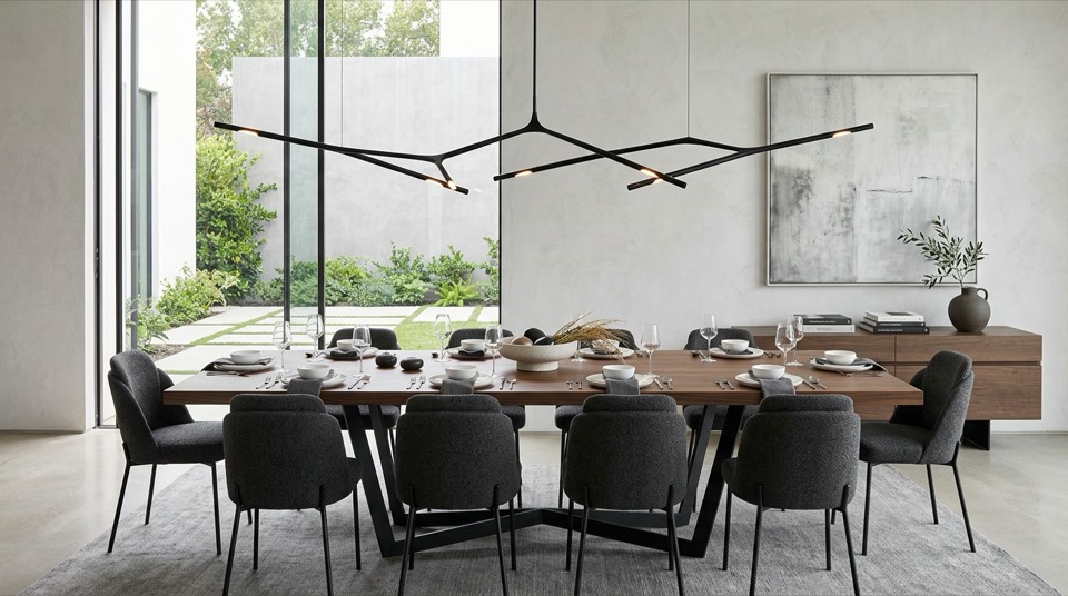 Chandelier hanging over dining t… — Chandeliers